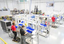 KAMA manufacturing students work on a manufacturing line at the RMTC campus in Battle Creek.