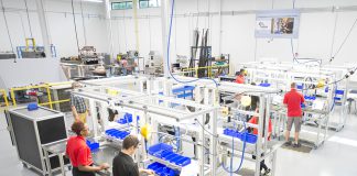 KAMA manufacturing students work on a manufacturing line at the RMTC campus in Battle Creek.