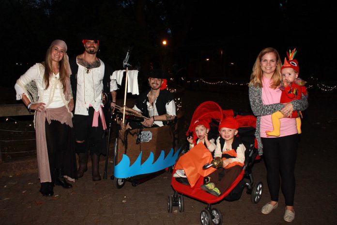 Group shot of people dressed up in halloween costumes.