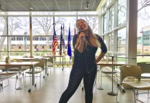 Drea singing karaoke in the Student Center at KCC