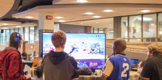 Students play Super Smash Bros. in the Student Center.