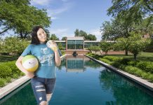 Photo of the North Ave. Campus with a girl holding a drink and a beach ball