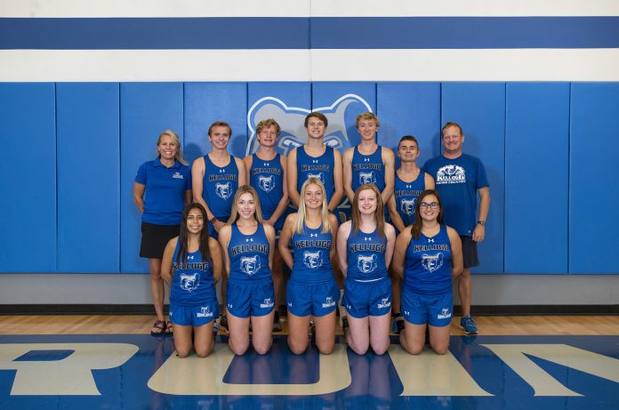 the 2020 KCC Cross Country teams pose for a photo in the gym