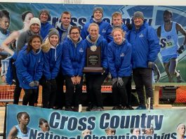 Photo of KCC Cross Country team in Iowa