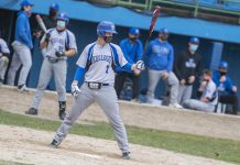 KCC's Jayden Dentler bats against Lake Michigan College during a home game in March.