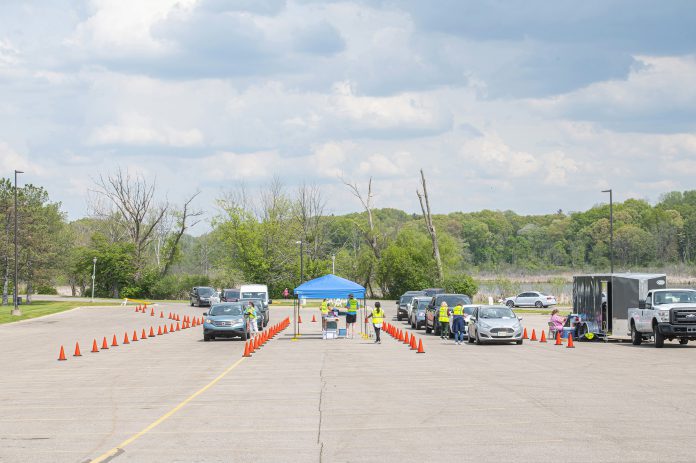 Cars line up during a vaccine clinic on Kellogg Community College's North Avenue campus in Battle Creek on May 20. Photo courtesy of KCC.