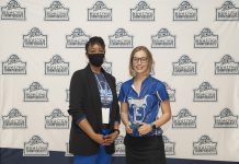 Kellogg Community College bowler Kelsey Kipp poses with KCC President Dr. Adrien Bennings with an award following the NJCAA Championship in Lansing. Photo courtesy of KCC.