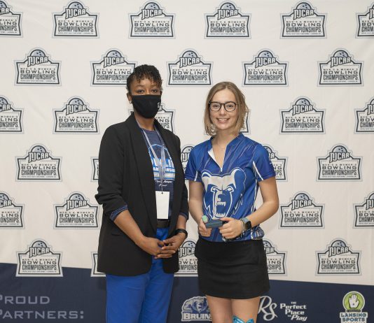 Kellogg Community College bowler Kelsey Kipp poses with KCC President Dr. Adrien Bennings with an award following the NJCAA Championship in Lansing. Photo courtesy of KCC.