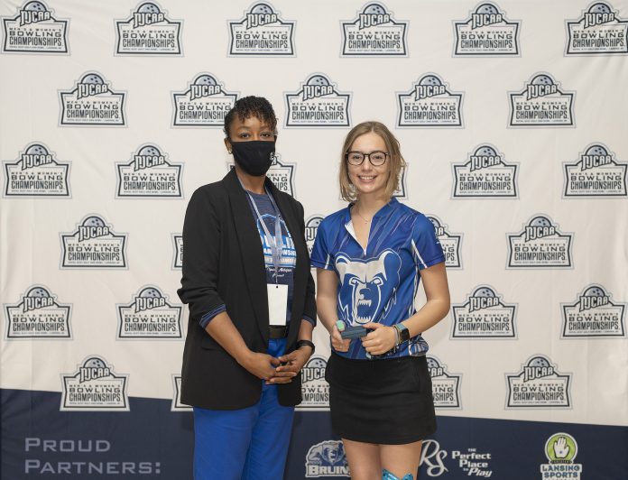 Kellogg Community College bowler Kelsey Kipp poses with KCC President Dr. Adrien Bennings with an award following the NJCAA Championship in Lansing. Photo courtesy of KCC.