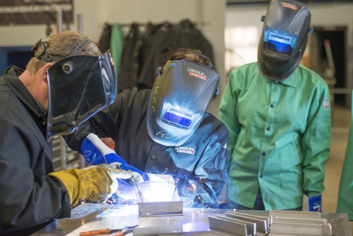 Students weld at the RMTC.