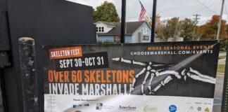 A sign depicting the information about marshall's skeleton fest