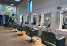 An interior view of an empty hair salon.