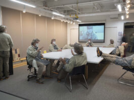 A classroom full of different versions of the same person in different poses.