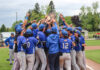 KCC baseball players celebrate after winning the regional championship. Photo by Allie Dietzel.